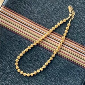 Napier gold metal wire necklace 15-17” length.
